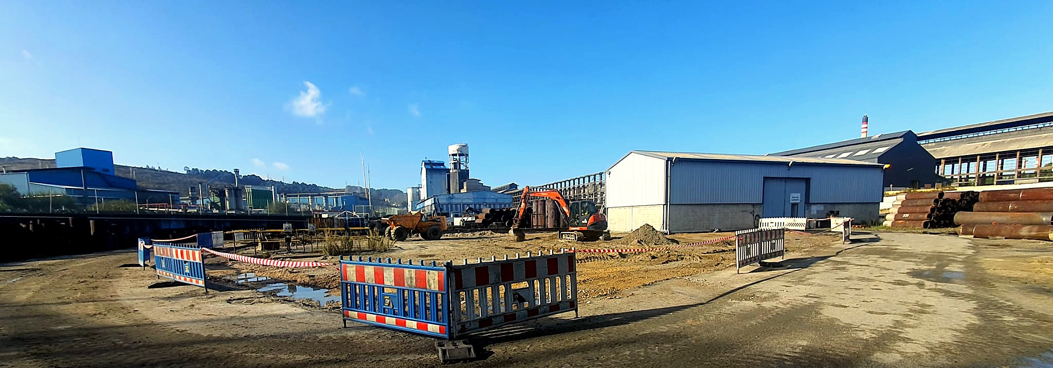 Excavator and dump truck at work